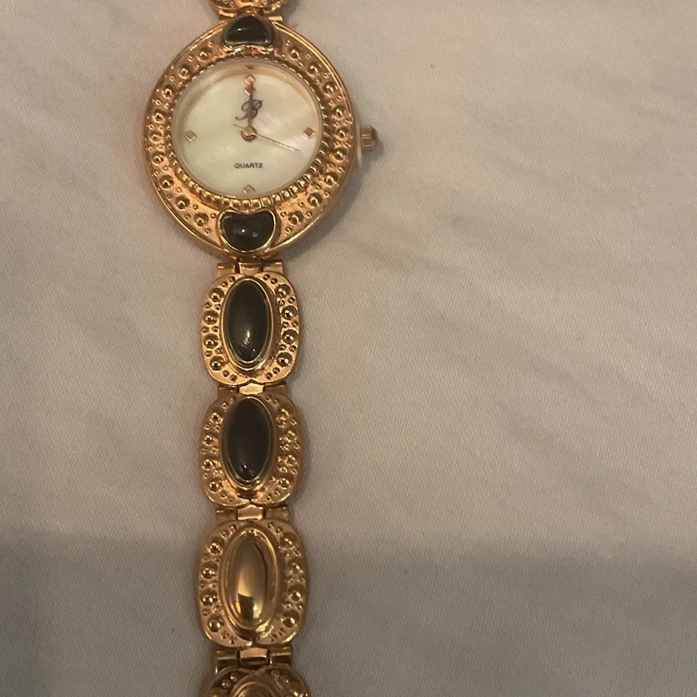 Elegant Gold and Black Women's Watch